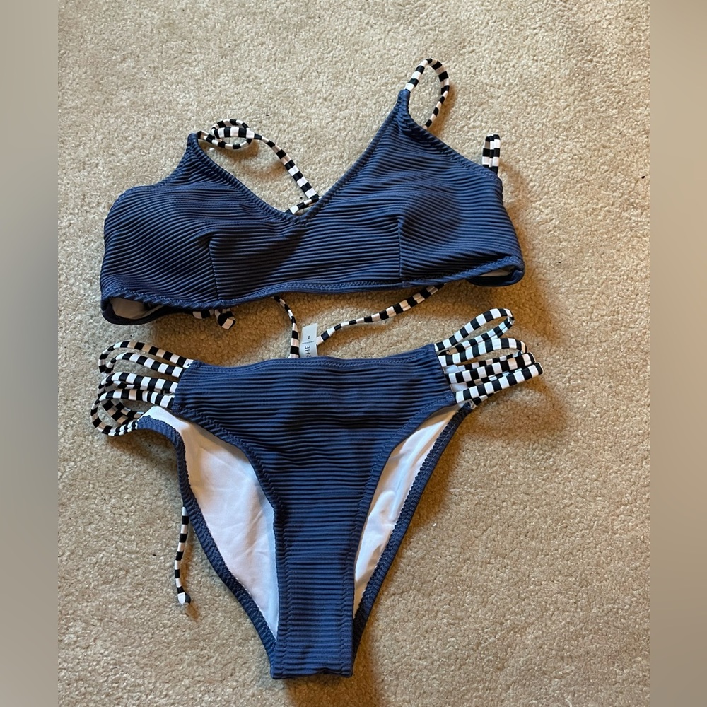 I am selling this blue bathing suit set from target. It is a size small